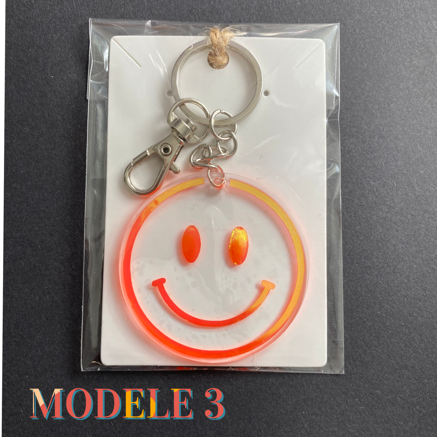 porte-clés happy face smiley holographiques orange