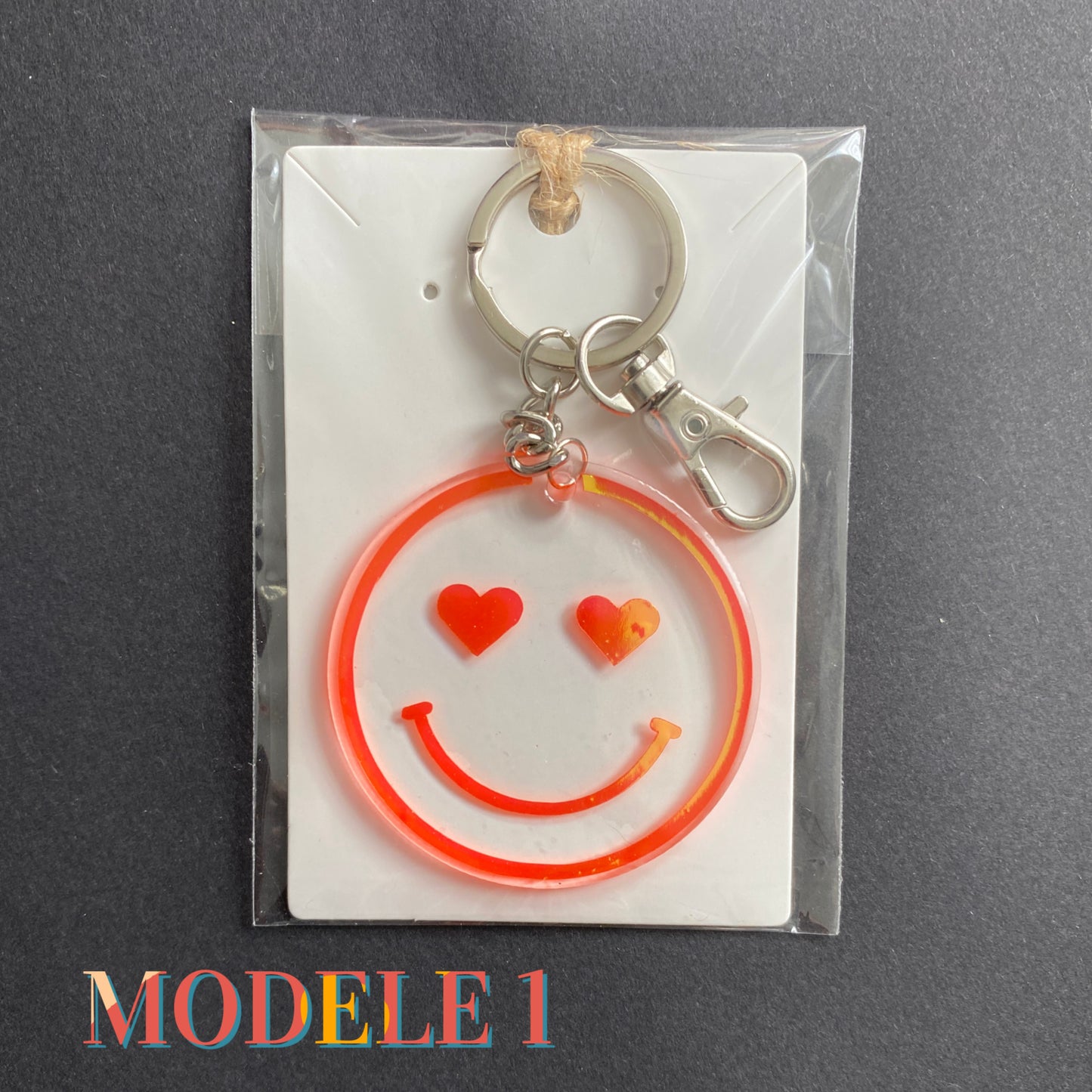 porte-clés happy face smiley holographiques orange