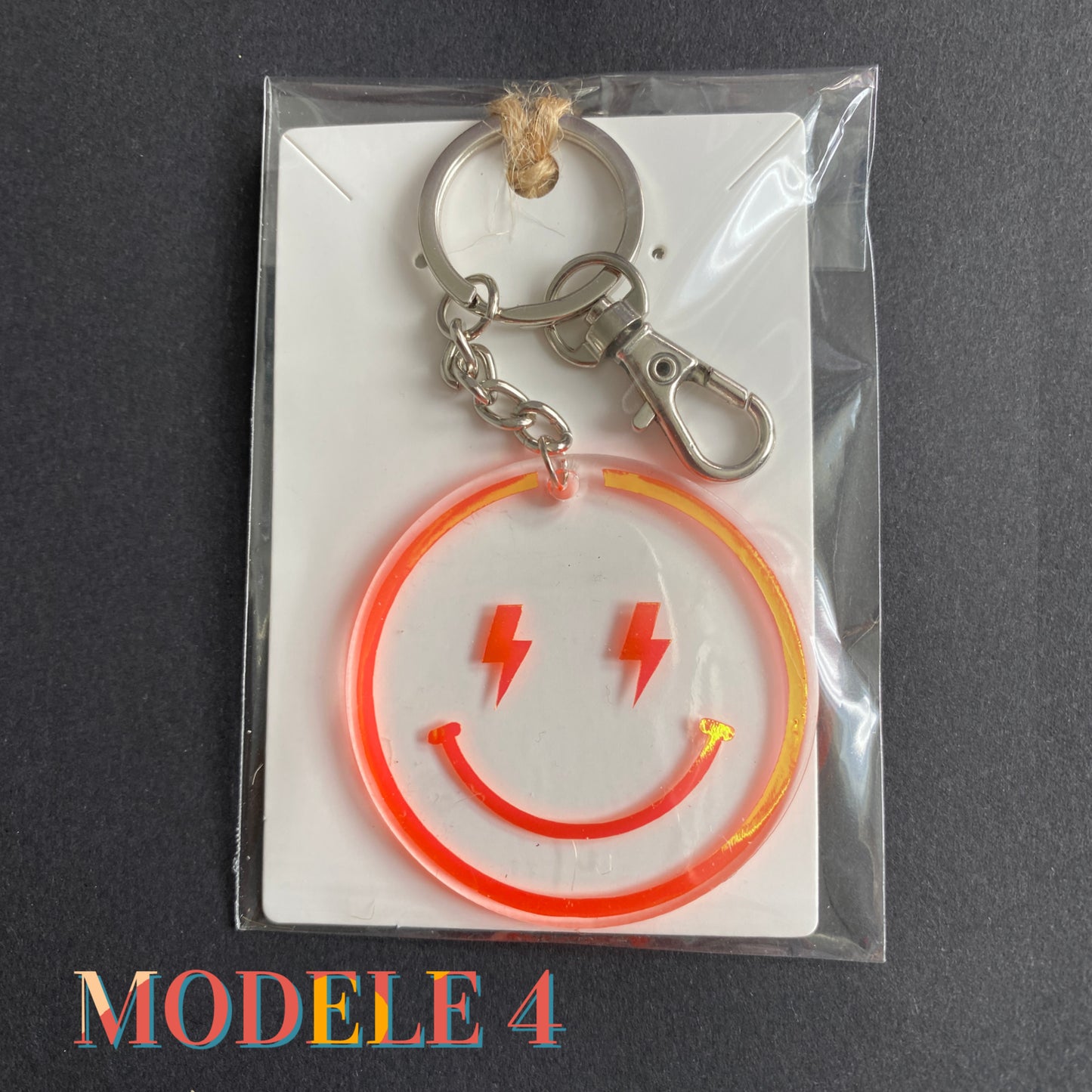 porte-clés happy face smiley holographiques orange