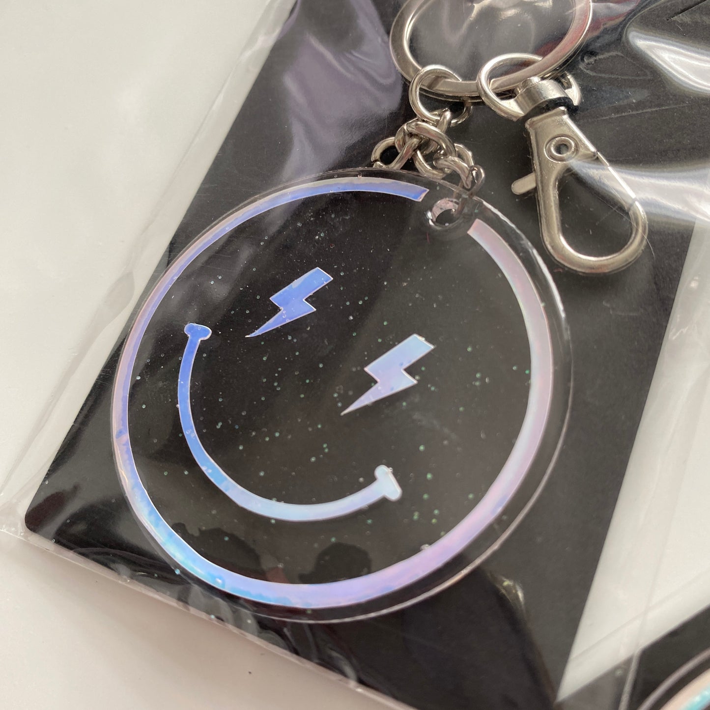 Porte-clés "Happy face" holographique