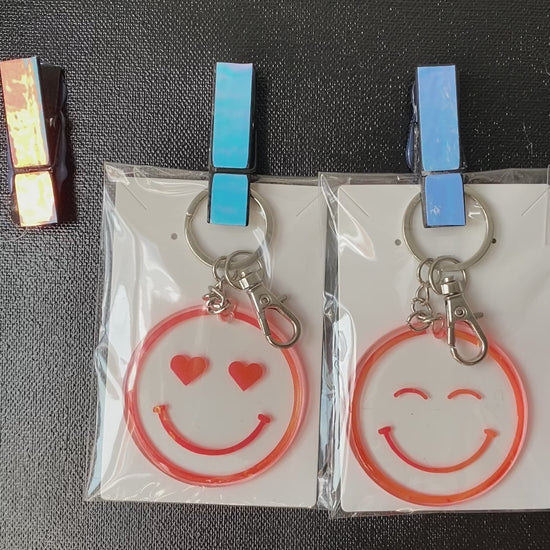 porte-clés happy face smiley holographiques orange